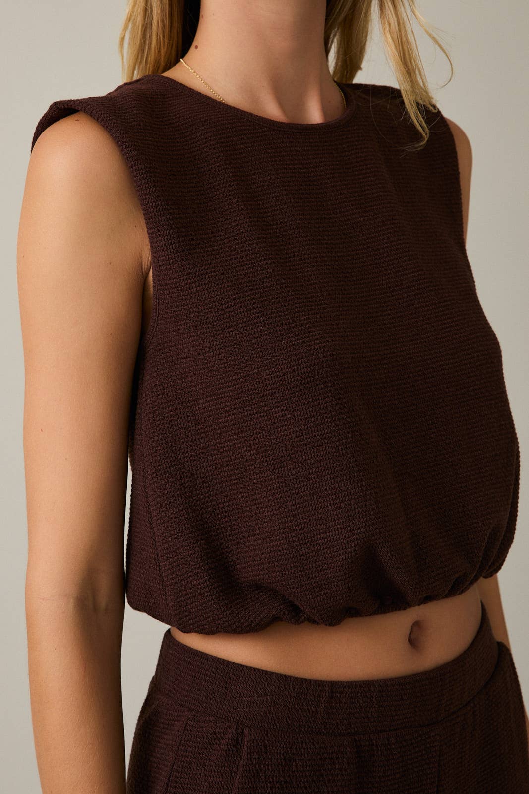 Sleeveless Bubble Hem Top